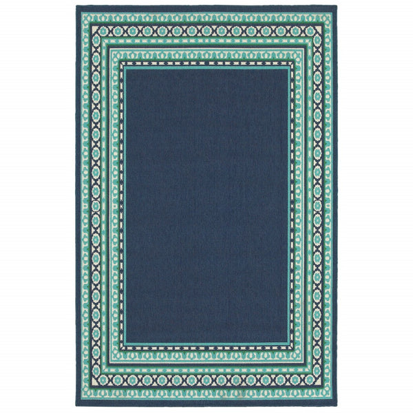 7’x10’ Navy and Green Geometric Indoor Outdoor Area Rug