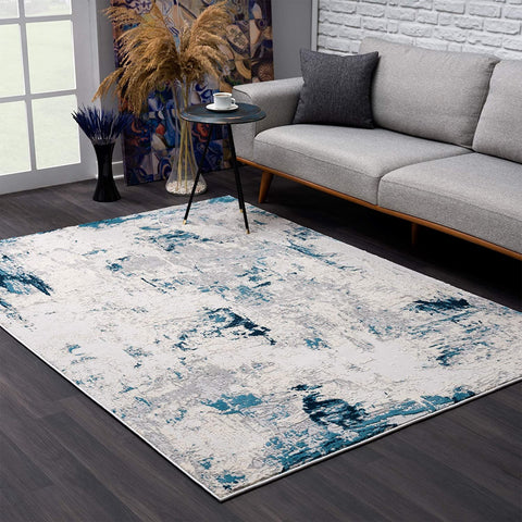 5’ x 8’ Blue and Ivory Abstract Strokes Area Rug