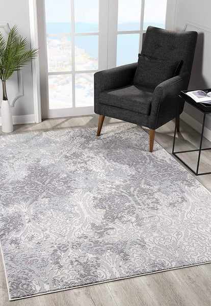 2’ x 4’ Cream and Gray Faded Filigree Area Rug