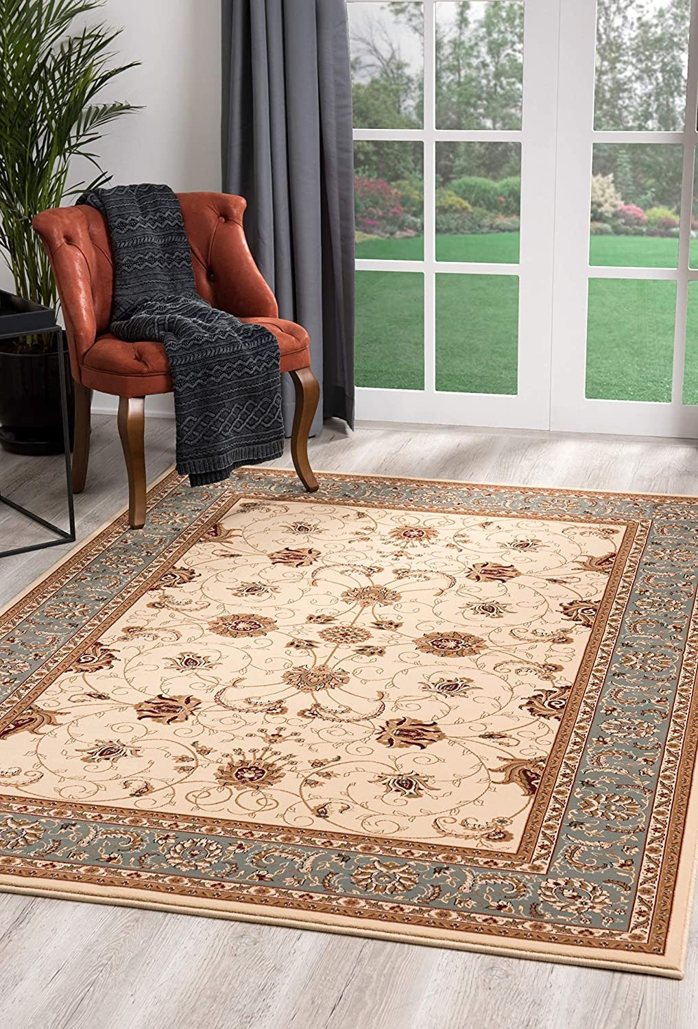 2’ x 4’ Cream and Blue Traditional Area Rug