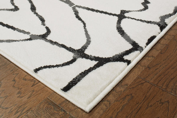 2’ x 7’ Cream and Black Distored Berber Runner Rug